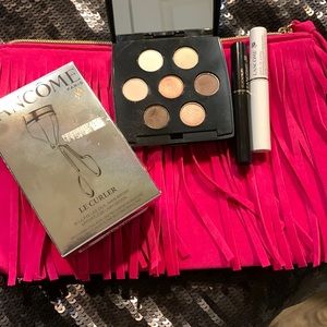 Lancôme Le Curler lash curler/Neiman Marcus pink fringed bag